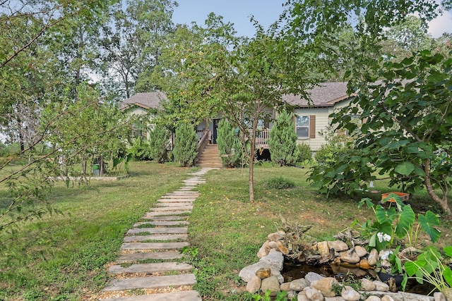 view of yard featuring stairway