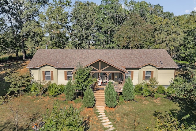 view of front of home with a front yard