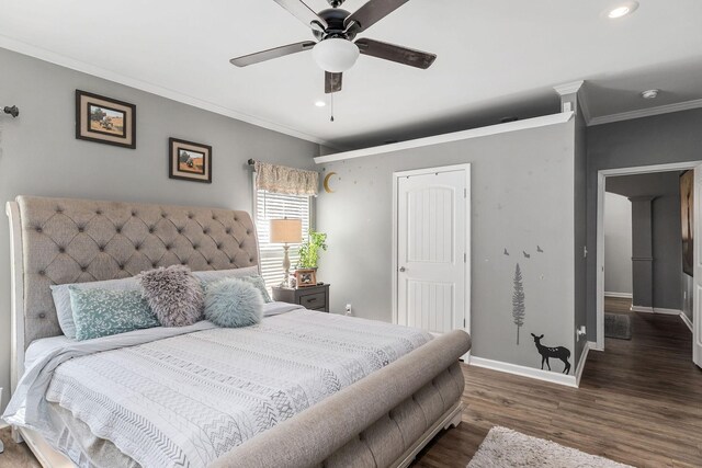 bedroom with dark wood-type flooring, ceiling fan, and ornamental molding