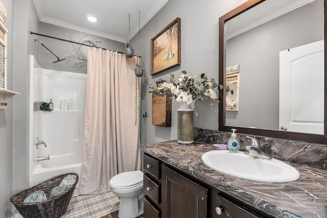 bathroom with vanity, toilet, crown molding, and shower / tub combo