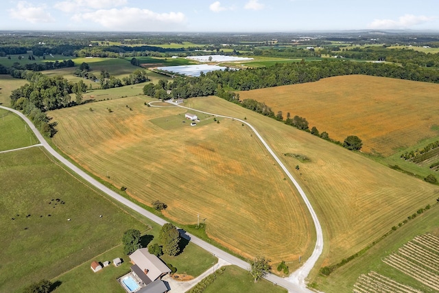 birds eye view of property featuring a rural view