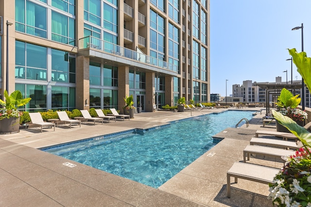 view of pool with a patio