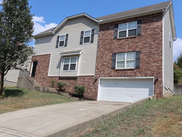 view of front of home featuring a garage