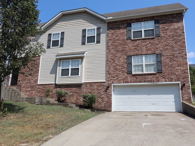 view of front of property with a garage