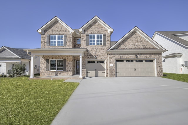 craftsman-style home featuring a front yard