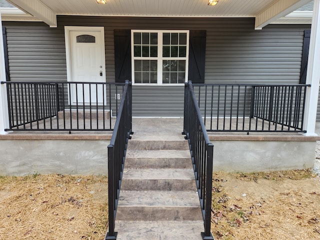 entrance to property with a porch