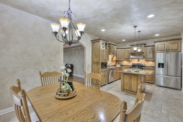 dining area with a chandelier