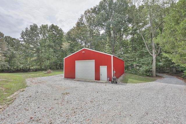 view of outbuilding with a garage