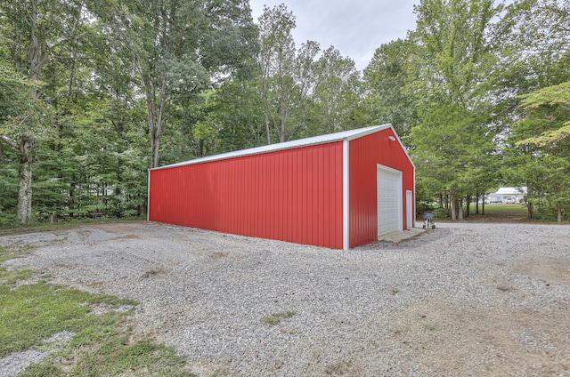 view of outbuilding with a garage