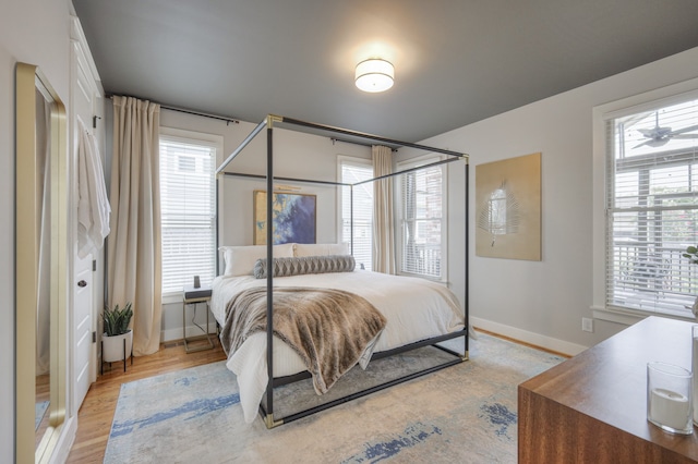 bedroom with light wood-type flooring