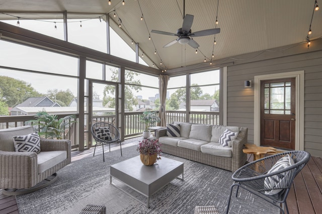 sunroom / solarium with ceiling fan