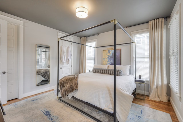 bedroom with light hardwood / wood-style flooring