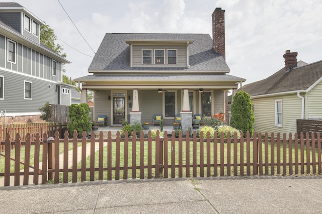 view of front of house with a front lawn and a porch