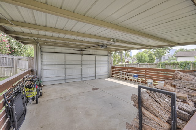 garage featuring a garage door opener