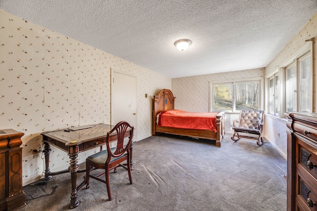 bedroom featuring carpet floors, wallpapered walls, baseboards, and a textured ceiling