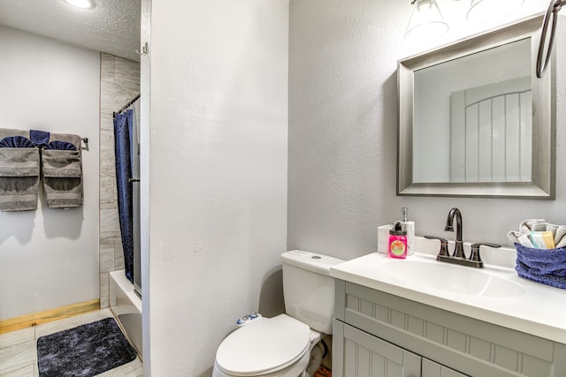 full bathroom featuring a textured ceiling, vanity, toilet, and shower / bathtub combination with curtain