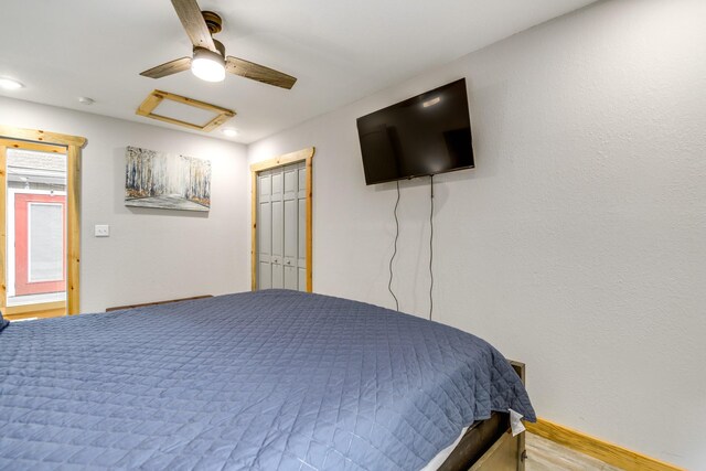 bedroom featuring a closet, ceiling fan, and wood-type flooring