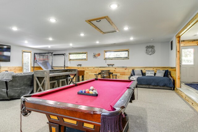 rec room with carpet, pool table, and wooden walls