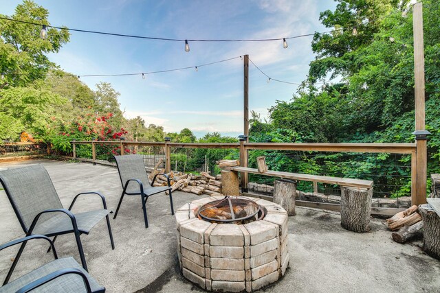 view of patio / terrace featuring a fire pit