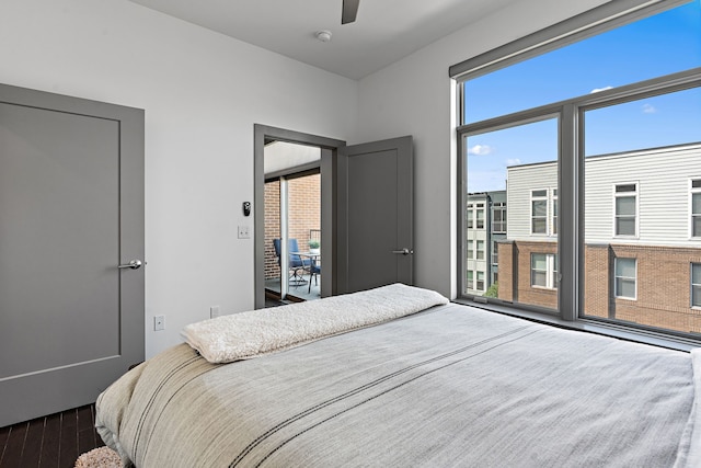 bedroom featuring ceiling fan and wood-type flooring