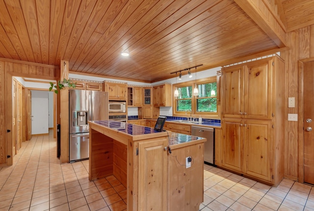 kitchen with wooden ceiling, a kitchen island, stainless steel appliances, and light tile patterned flooring