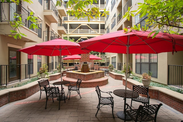 view of home's community with a patio area