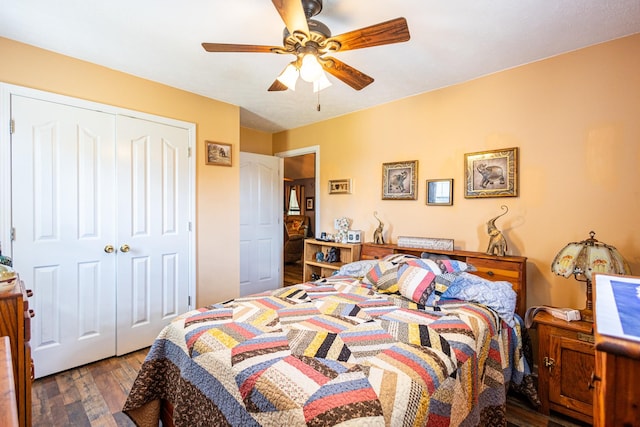 bedroom with a closet, wood finished floors, and a ceiling fan