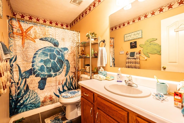 full bath with vanity, visible vents, curtained shower, tile patterned floors, and toilet