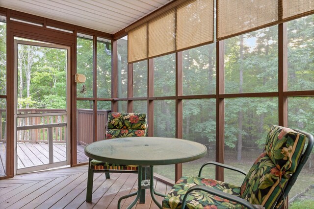 sunroom with wood ceiling