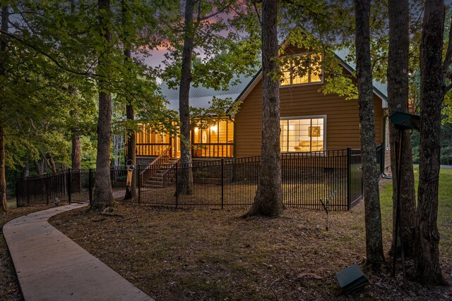 view of property exterior at dusk