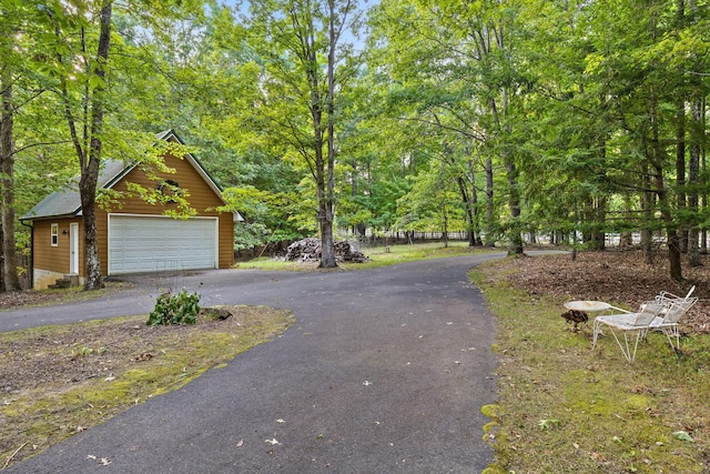 view of road with aphalt driveway