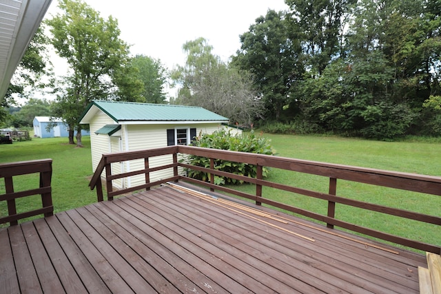 deck featuring a lawn