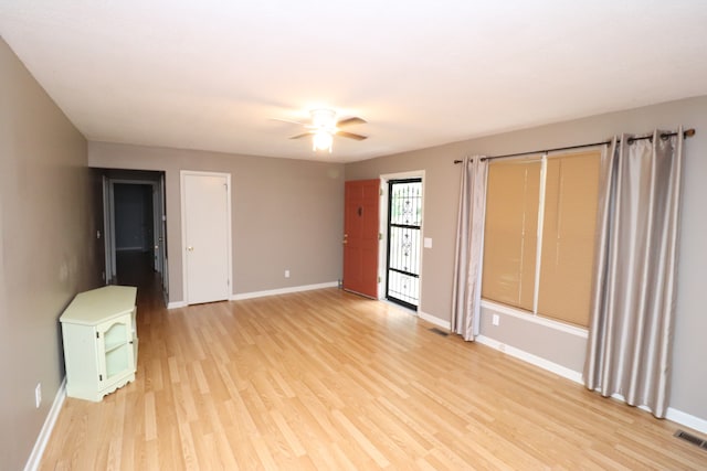 interior space featuring ceiling fan and light hardwood / wood-style floors