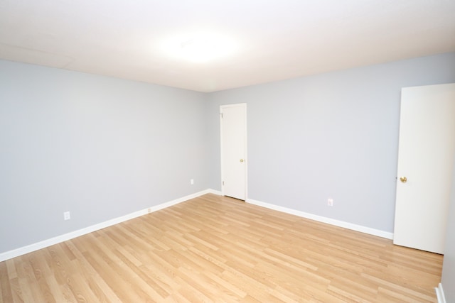 unfurnished room featuring light hardwood / wood-style floors