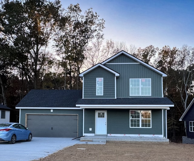 front of property featuring a garage