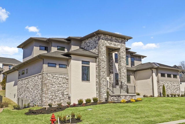 view of home's exterior with cooling unit, stone siding, and a lawn