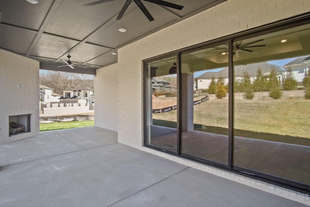 view of patio / terrace featuring a ceiling fan