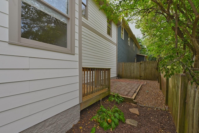 view of side of property with fence