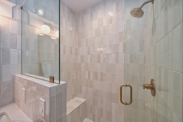 full bathroom featuring a shower stall