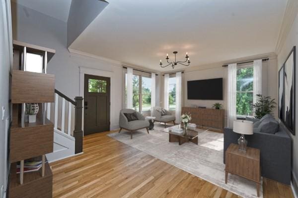 living area featuring stairway, a healthy amount of sunlight, and light wood-style flooring