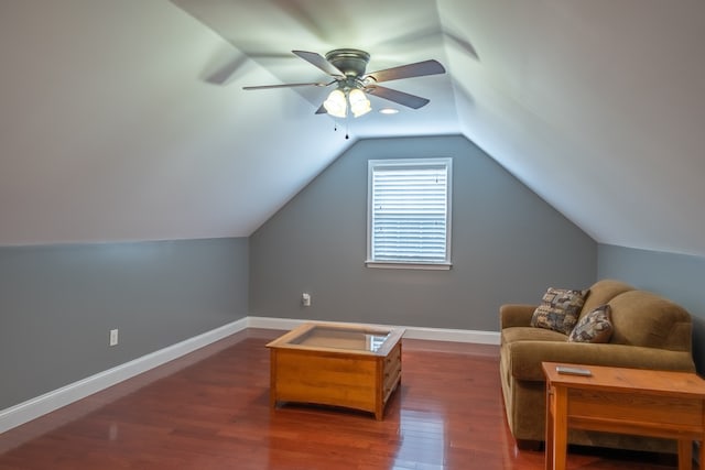 bonus room featuring ceiling fan, vaulted ceiling, and dark wood-type flooring