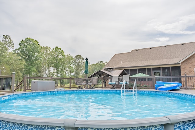 view of pool with a deck