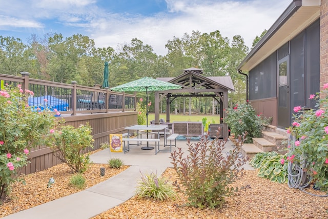 view of yard featuring a patio and a gazebo