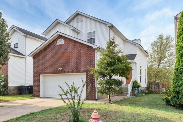 front of property with a garage and a front yard