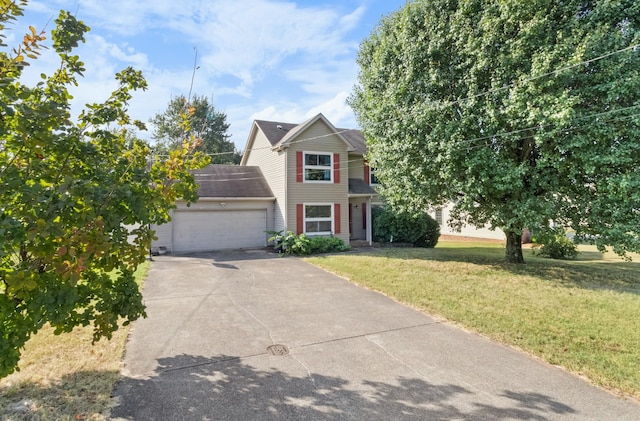 view of front of house featuring driveway, a front lawn, roof with shingles, and an attached garage