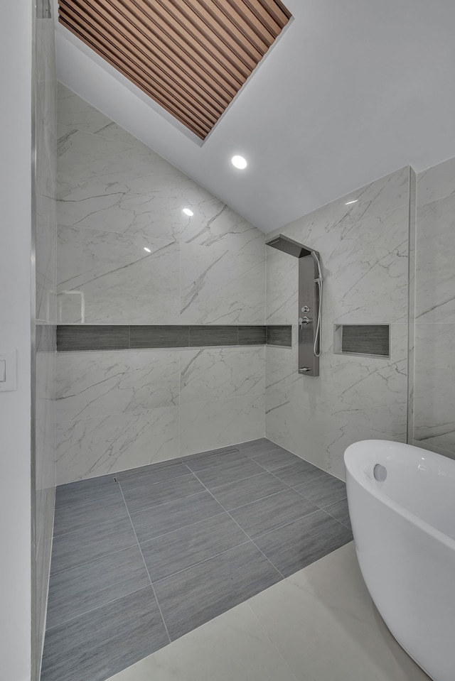 bathroom featuring a tub to relax in