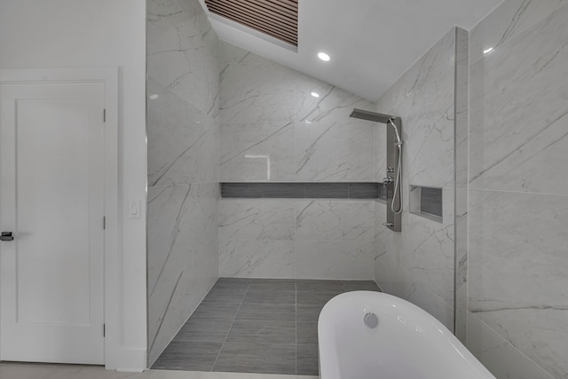 bathroom featuring shower with separate bathtub and vaulted ceiling