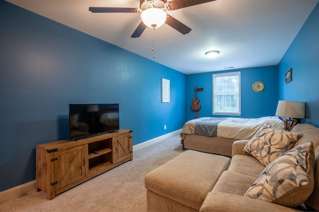 bedroom with light colored carpet and ceiling fan