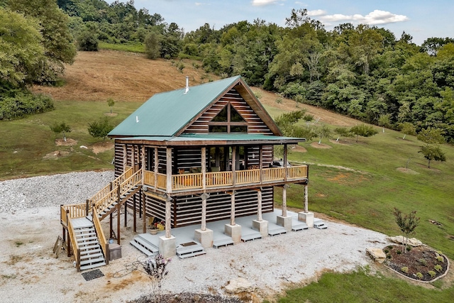 4818 Ensor Hollow Rd, Buffalo Valley, TN 38548 - back of house with stairway, a wooden deck, and metal roof
