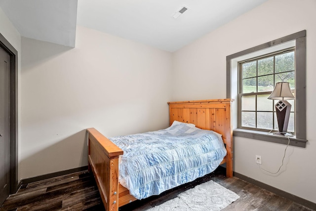 4818 Ensor Hollow Rd, Buffalo Valley, TN 38548 - bedroom featuring baseboards, wood finished floors, and visible vents